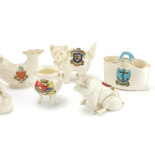 2279 - Crested china including a pair of Arcadian bulldogs and a Carlton elephant, various crests, the larg... 