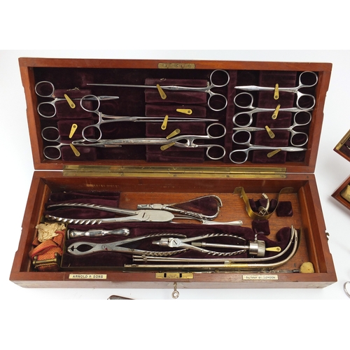 113 - World War I Army Field Surgeon's Surgical set, housed in a fitted Arnold & Sons mahogany case with b... 