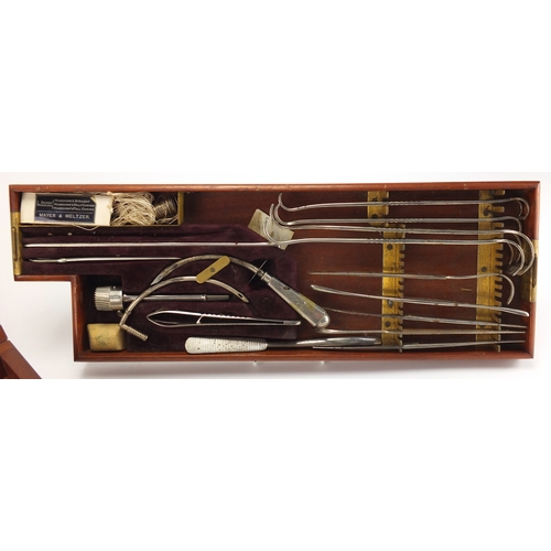 113 - World War I Army Field Surgeon's Surgical set, housed in a fitted Arnold & Sons mahogany case with b... 