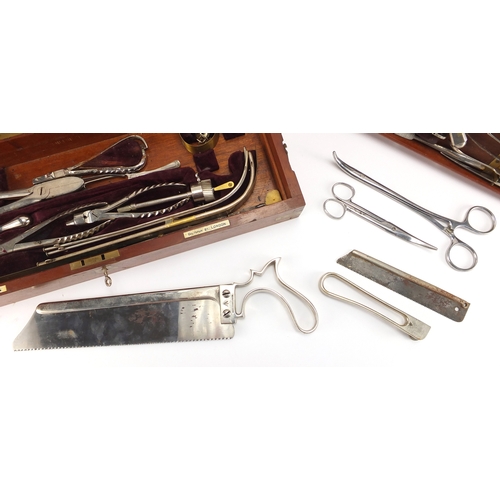 113 - World War I Army Field Surgeon's Surgical set, housed in a fitted Arnold & Sons mahogany case with b... 