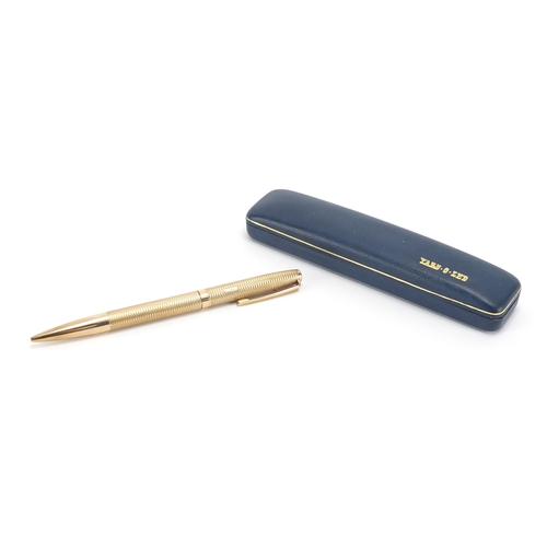 121 - 9ct gold Yard-O-Led ball point pen, with engine turned body and fitted case, approximate weight 28.6... 