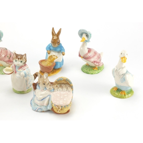 2404 - Twelve Royal Albert and Beswick Beatrix Potter figures including Tabitha Twitchit, Mrs Tiggy-Winkle ... 