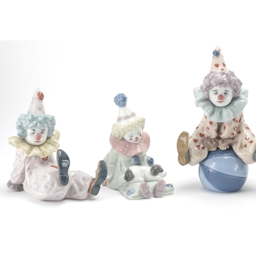 2467 - Five Lladro clown figures, with boxes, the largest 15cm high