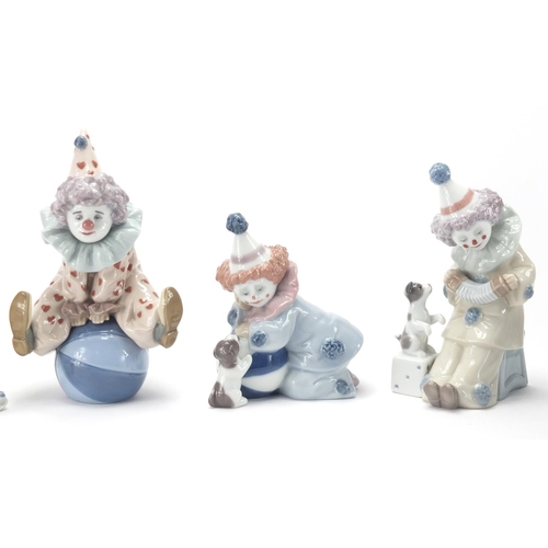 2467 - Five Lladro clown figures, with boxes, the largest 15cm high