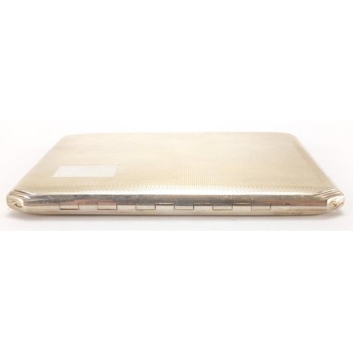 2537 - Rectangular silver cigarette case, with engine turned decoration, Birmingham 1964, 11.5cm x 8.cm, ap... 