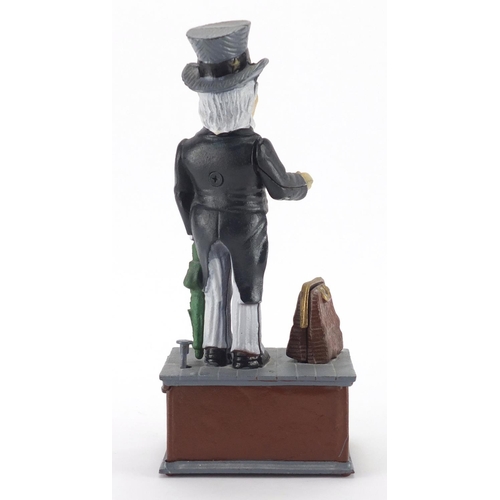 2188 - Novelty hand painted cast iron Uncle Sam money box, 28cm high