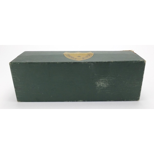 2180 - Bottle of Dom Pérignon housed in a sealed box, MM 250-001 (undated)