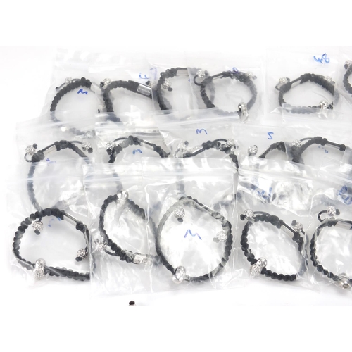 2813 - Collection of Mitroshina bracelets, with silver charms