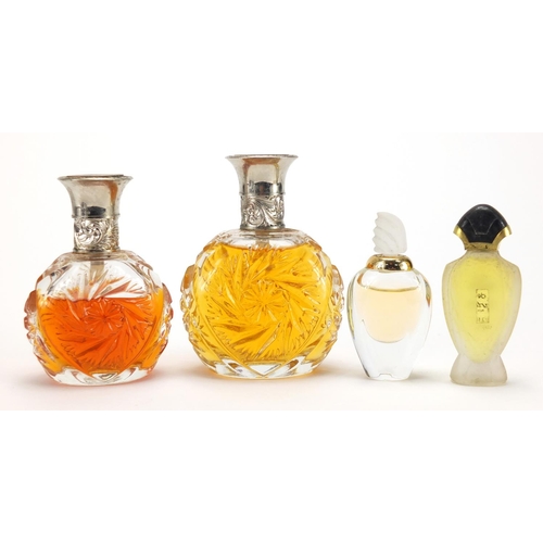 2118 - Four vintage shop facet dummy bottles of perfume, comprising two Ralph Lauren, Cartier and Givenchy ... 