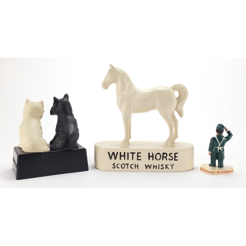 2309 - Advertising items comprising a Carlton Ware Guinness figure, White Horse Scotch Whisky ceramic model... 