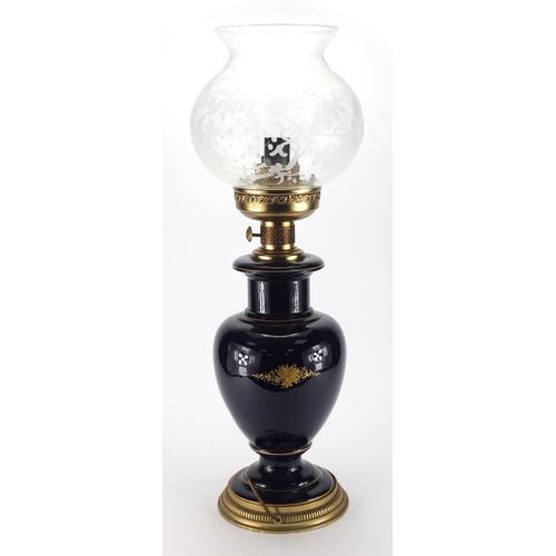 2298 - Ornate porcelain oil lamp, decorated with a oval panel of two lovers, with etched glass shade,  73cm... 