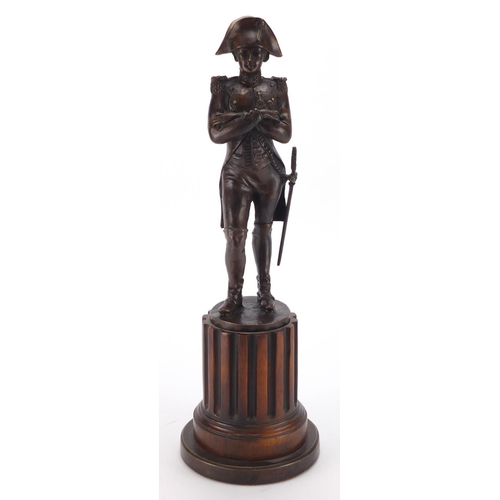 2168 - Patinated bronze study of Napoleon Bonaparte, on a wooden base, overall 48cm high