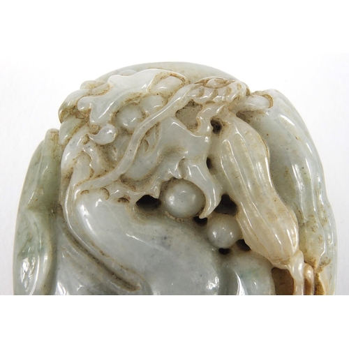 2512 - Chinese pale green jade touch stone, carved with a dragon, 8cm in length