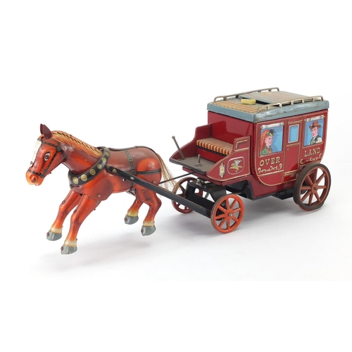 666 - Japanese tin plate Overland stagecoach with box, 38cm in length