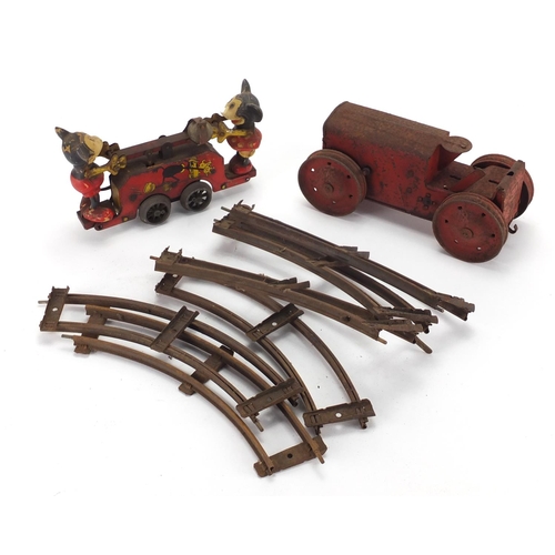 653A - Antique tin plate clockwork tractor and Mickey Mouse clockwork seesaw bell, the largest 21cm in leng... 