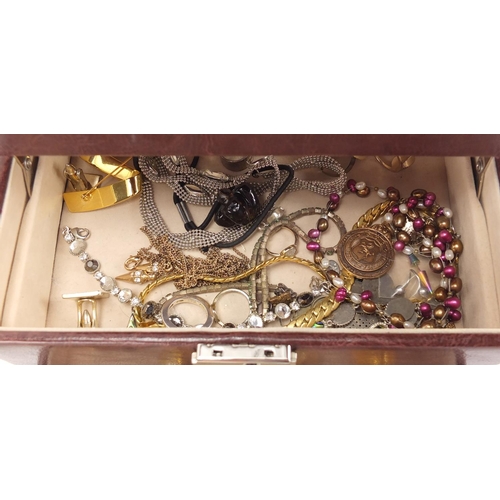 2743 - Costume jewellery including silver rings, ladies wristwatches, necklaces and earrings, housed in a b... 