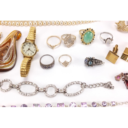 2743 - Costume jewellery including silver rings, ladies wristwatches, necklaces and earrings, housed in a b... 