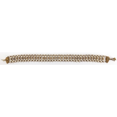 2744 - Miriam Haskell  designer simulated pearl and gilt metal necklace, 34cm in length, with original rece... 