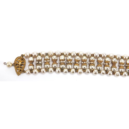 2744 - Miriam Haskell  designer simulated pearl and gilt metal necklace, 34cm in length, with original rece... 