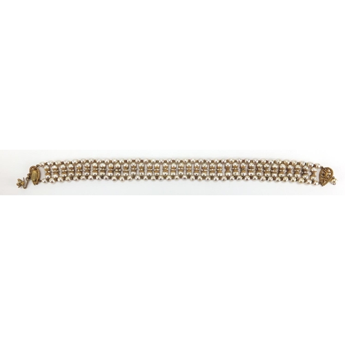 2744 - Miriam Haskell  designer simulated pearl and gilt metal necklace, 34cm in length, with original rece... 