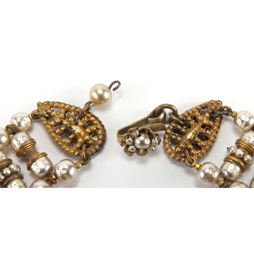 2744 - Miriam Haskell  designer simulated pearl and gilt metal necklace, 34cm in length, with original rece... 