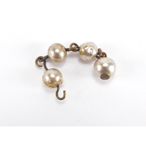 2744 - Miriam Haskell  designer simulated pearl and gilt metal necklace, 34cm in length, with original rece... 