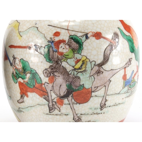 2197 - Chinese porcelain jar and vase, each hand painted in the famille verte palette with warriors on hors... 