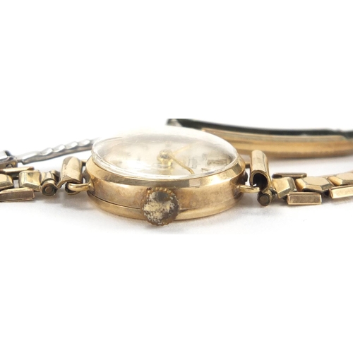 2787 - Ladies 9ct gold Golay wristwatch with gilt metal strap, 1.8cm in diameter