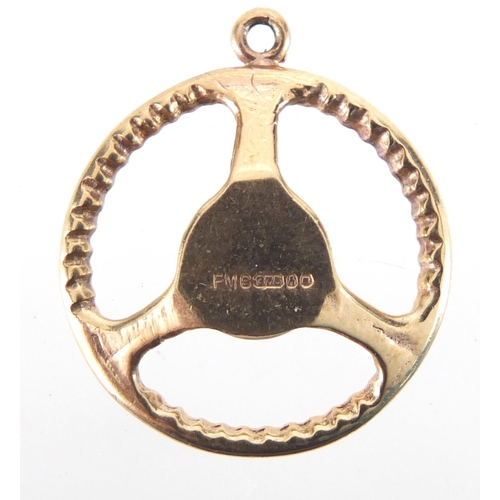 2659 - 9ct gold steering wheel charm, 1.8cm in diameter, approximate weight 2.0g