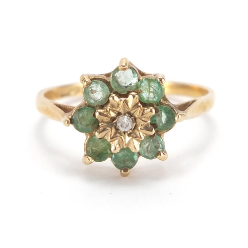 2692 - 9ct gold emerald and diamond flower head ring, size P, approximate weight 2.0g