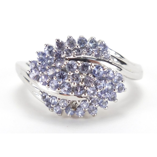 2764 - 9ct white gold purple stone dress ring, size O, approximate weight 5.8g