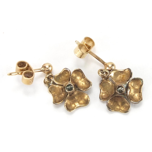 2637 - Pair of 9ct gold diamond flower head earrings, 1cm in diameter, approximate weight 1.3g