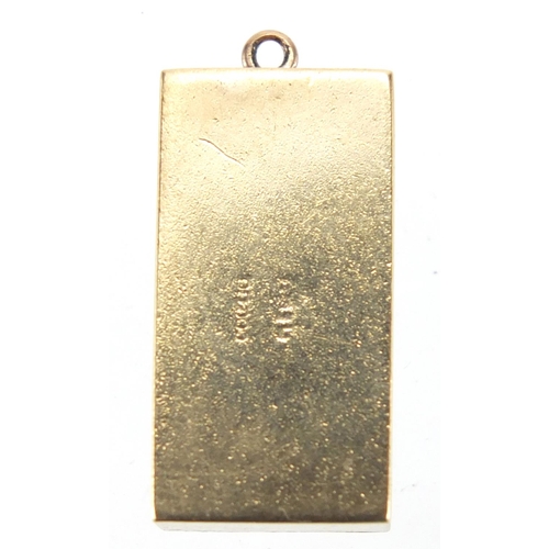 2654 - 9ct gold emergency one pound note charm, 2.3cm in length, approximate weight 3.6g