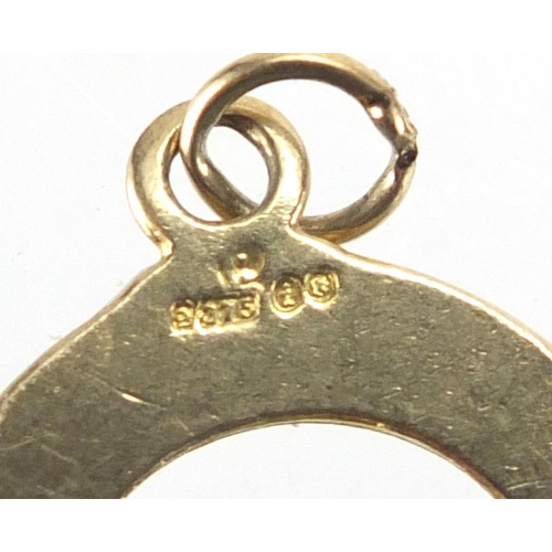 2679 - Two 9ct gold charms, 21 and an anchor, approximate weight 1.8g