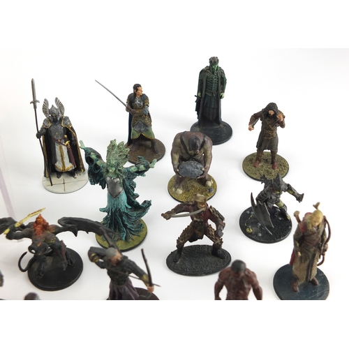 673A - Collection of hand painted metal Lord of The Rings figures including Fell Beast and Arwen, the large... 