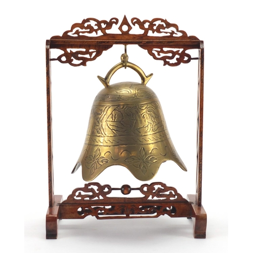 2170 - Chinese bronze bell engraved with mythical animals, housed in a hard wood hanging frame, overall 33c... 