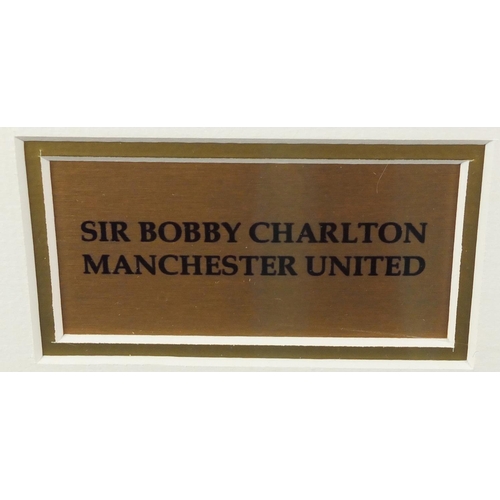 2221 - Manchester United 1963 football jersey, signed by Sir Bobby Charlton, mounted and framed, 48.5cm x 3... 