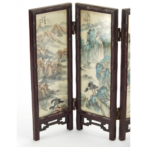 2236 - Oriental four fold screen, each panel hand painted with birds of Paradise and a river landscape, 26c... 