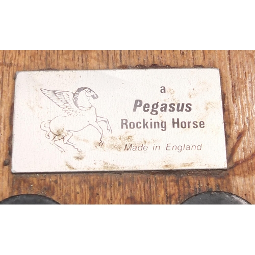 2062 - Large Pegasus rocking horse, 115cm high x 136cm in length