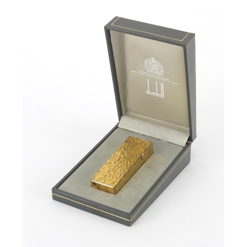 2521 - Dunhill gold plated bark design pocket lighter, with fitted box, 6.5cm high