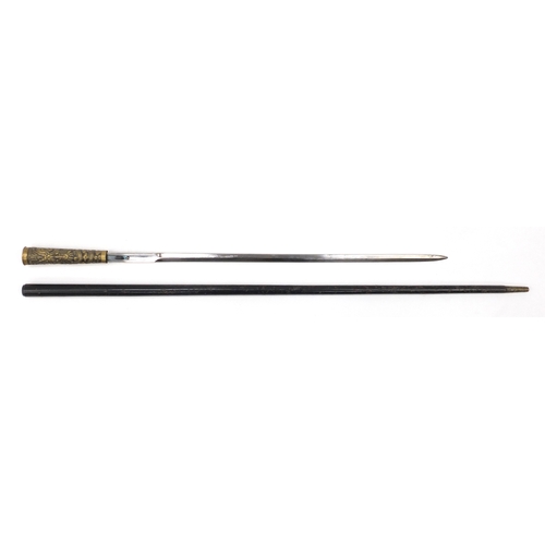 105 - Black painted metal swordstick with brass handle embossed with a Chinese dragon, 89.5cm in length