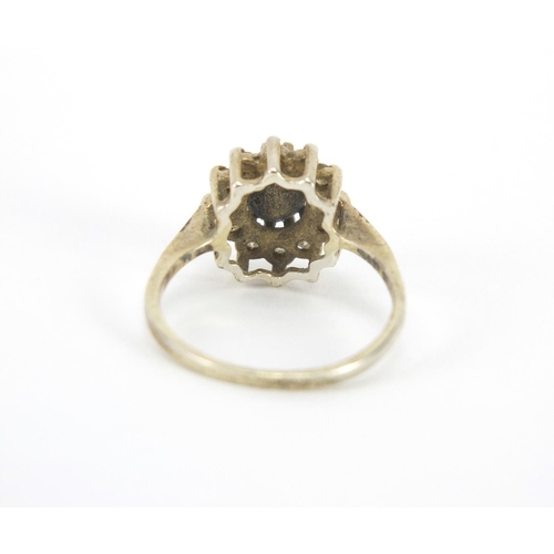 2663 - Unmarked gold sapphire and diamond flower head ring, size N, approximate weight 2.5g