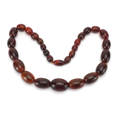 2807 - Horn bead necklace, possibly rhino horn, the largest bead 3.5cm wide, approximate weight 178g