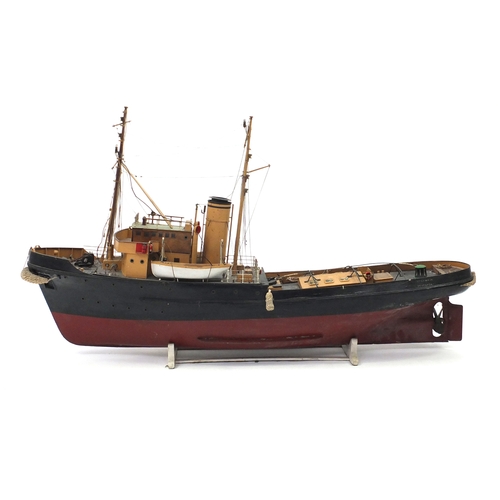 109 - 1940's scratch built model boat, Stormkin Devonport, on wooden stand, 56cm high x 102cm in length