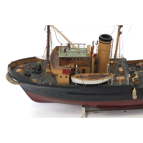 109 - 1940's scratch built model boat, Stormkin Devonport, on wooden stand, 56cm high x 102cm in length