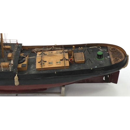 109 - 1940's scratch built model boat, Stormkin Devonport, on wooden stand, 56cm high x 102cm in length