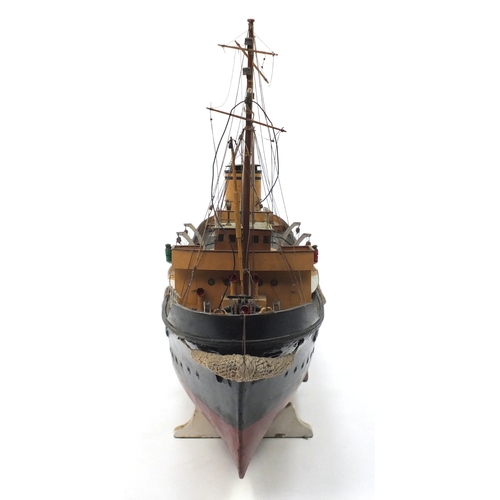 109 - 1940's scratch built model boat, Stormkin Devonport, on wooden stand, 56cm high x 102cm in length