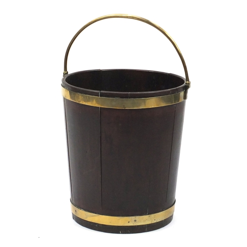 70 - 18th century Irish brass bound mahogany peat bucket, with brass swing handle 46cm high excluding the... 