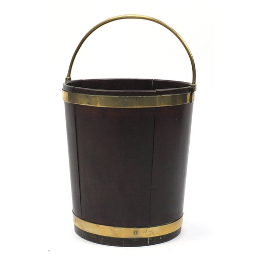 70 - 18th century Irish brass bound mahogany peat bucket, with brass swing handle 46cm high excluding the... 