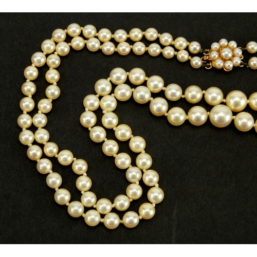 2733 - Two string pearl necklace, with 9ct gold clasp, 48cm in length, approximate weight 45.8g